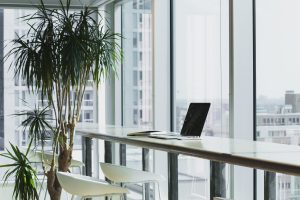 Laptop at Tall Commercial Property Work Space