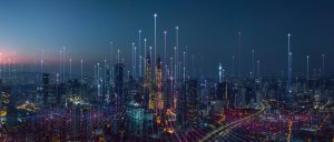 A digital abstract overlay on a city skyline at night