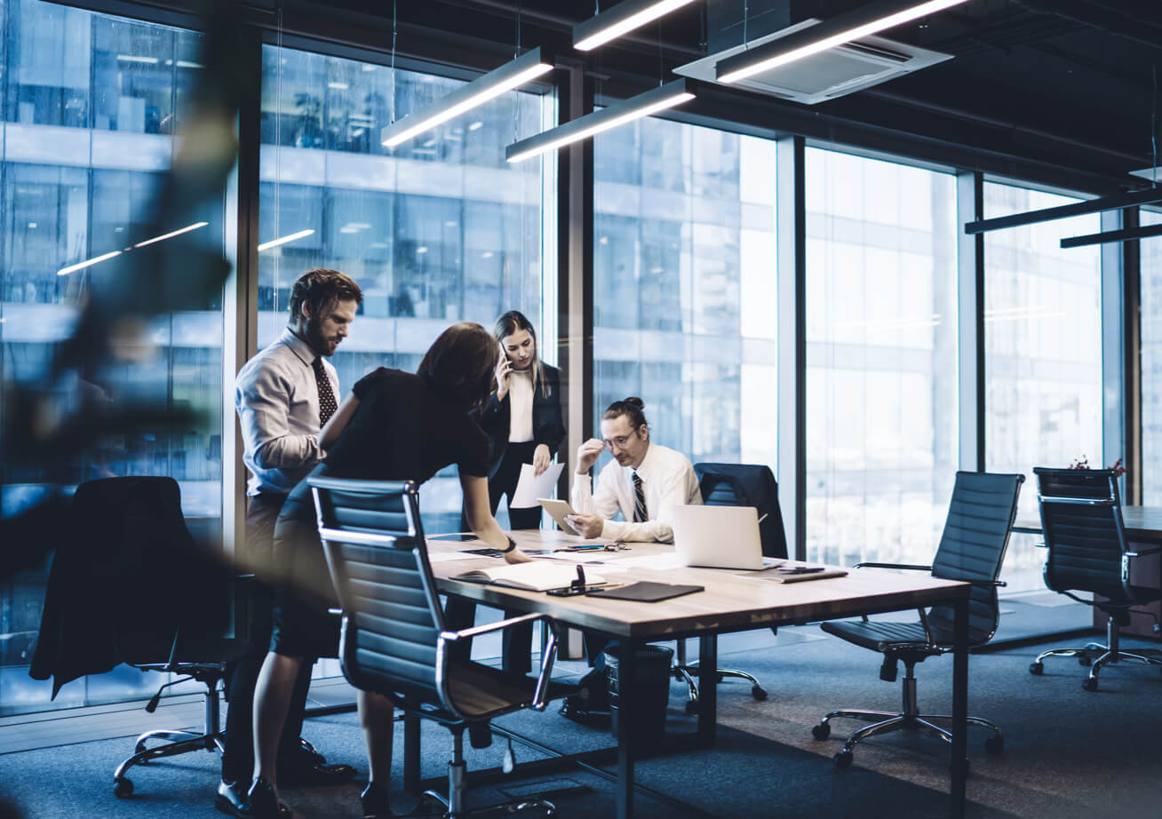 Lawyers working in a meeting room of a high-rise office building