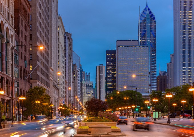 An evening view of Michigan Avenue with traffic wizzing by